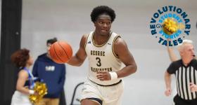 Darren Buchanan Jr. dribbling up and down the court.