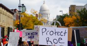 Protesters march in Madison, Wis., after the May 2022 leak of the U.S. Supreme Court's decision in Dobbs v. Jackson. (Adobe)