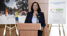 D.C. Mayor Muriel Bowser speaks at the podium