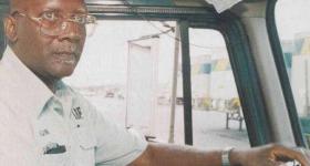 A freight worker driving a truck, featured on the cover of Teamster Magazine. (GW SCRC)