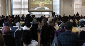 Teaching Day attendees caught a remote keynote from expert Joshua Eyler during lunch. (William Atkins/GW Today)