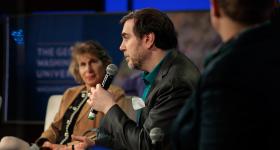 David Broniatowski speaks at the conference's closing panel, as fellow panelist Susan Ariel Aaronson looks on. (William Atkins/GW Today)