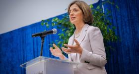 Kelly Gebo is installed as the Michael and Lori Milken Dean of the Milken Institute School of Public Health at a ceremony Nov. 4. (Abby Greenawalt/GW Today)