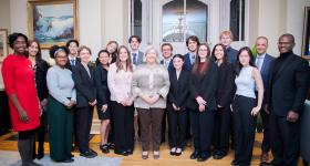 President Granberg poses with Clark Scholars, GW faculty and representatives from the Clark Foundation at the F Street House in November. (Abby Greenawalt/GW Today). 